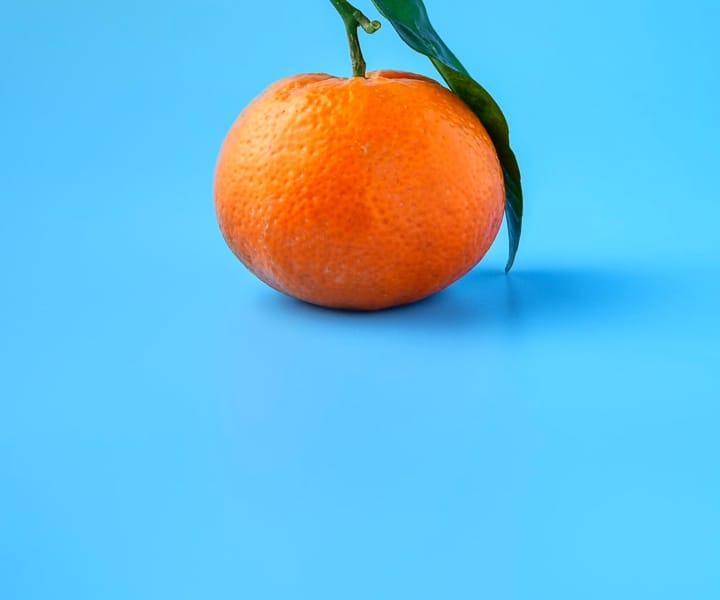 orange with green background 